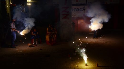 Indian people burst fire crackers as smokes of fire crackers appears in atmosphere, on the ocassion of Diwali festival, in Allahabad on October 30,2016.Fire crackers bursting during Diwali has increased the pollution level in the various part of the country,with toxic fumes from fireworks reaising the perticulate matter content in the air to five-six times higher than the permissible limit.According to the National air quality index provided by the central pollution control board in various cities, the prominent pollutant PM 2.5 was hovering between 200 and 500 in major cities. (Photo by Ritesh Shukla/NurPhoto via Getty Images)