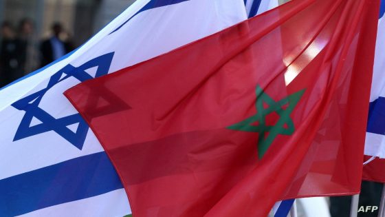 Israeli and Moroccan flags are pictured during an official ceremony in Israel's Mediterranean coastal city of Tel Aviv, on September 13, 2022. (Photo by JACK GUEZ / AFP)