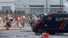 Protesters throw stones against riot police during a demonstration against alleged corruption in the town of Al-Hoceima, Morocco July 20, 2017. REUTERS/Youssef Boudlal