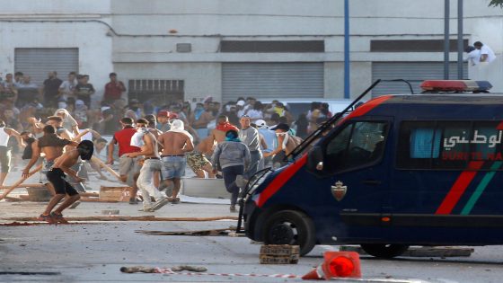 Protesters throw stones against riot police during a demonstration against alleged corruption in the town of Al-Hoceima, Morocco July 20, 2017. REUTERS/Youssef Boudlal
